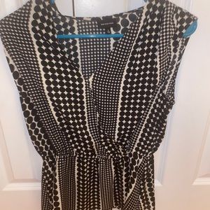 Black and beige patterned blouse